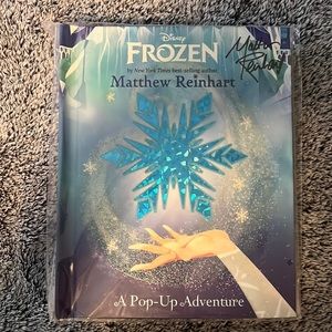 Frozen pop up book by Matthew Reinhardt and signed by author